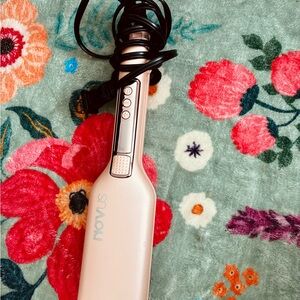 Pink hair crimper/ waver.